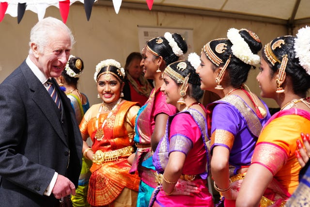 The King meets performers at a celebration at Edinburgh Castle to mark the 900th anniversary of the city at the start of July