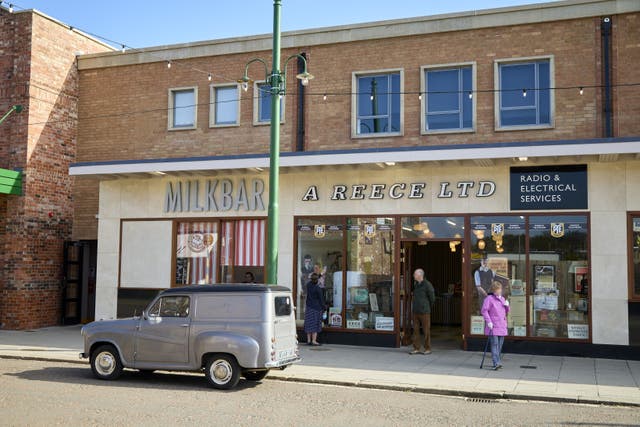 1950s shops and a vehicle at Beamish, The Living Museum Of The North