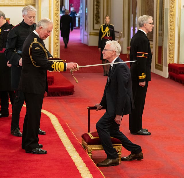 Sir Norman Lamb is knighted by the Prince of Wales at Buckingham Palace (Dominic Lipinski/PA)