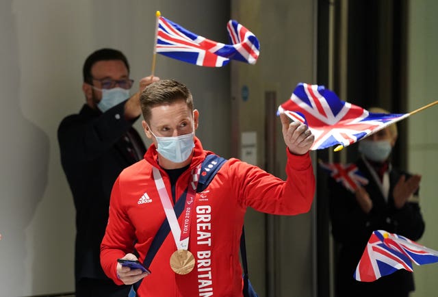 Great Britain’s Terry Bywater arrives at Heathrow Airport after helping Great Britain win wheelchair basketball bronze in Tokyo