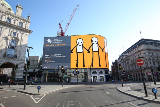 Holding Hands at Piccadilly Circus