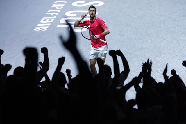 Novak Djokovic gestures to the crowd