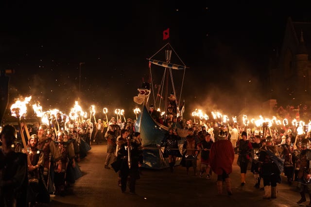 The Jarl Squad set light to a galley in Lerwick on the Shetland Isles during the Up Helly Aa fire festival