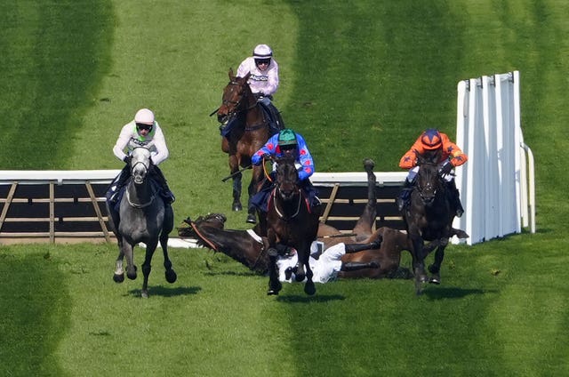 Constitution Hill and jockey Nico de Boinville fall during the William Hill Aintree Hurdle 