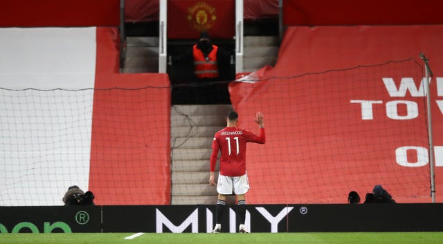 Manchester United's Mason Greenwood celebrates scoring his side's first goal against Liverpool