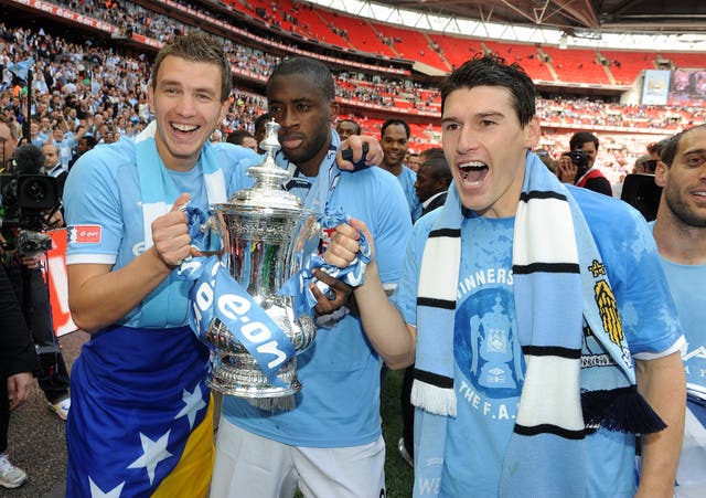 Barry (right) helped City win the FA Cup and Premier League