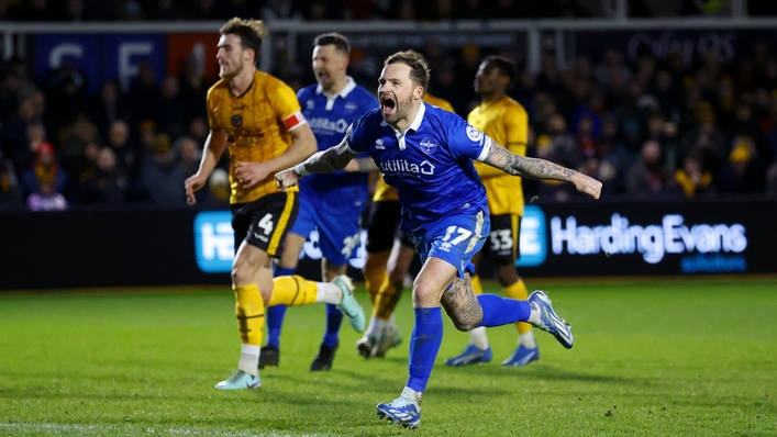 Eastleigh forward Chris Maguire levelled with an 82nd-minute penalty at Newport