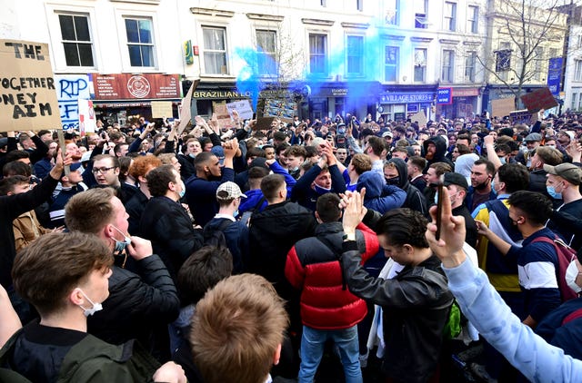 Fans protest against Chelsea’s involvement in the new European Super League outside Stamford Bridge 