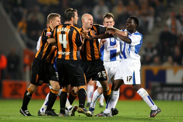 Danny Mills, playing for Hull, in an altercation on the football pitch. 