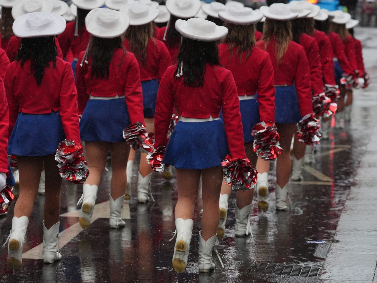 Revellers brave wind, rain and grey skies to watch New Year’s Day