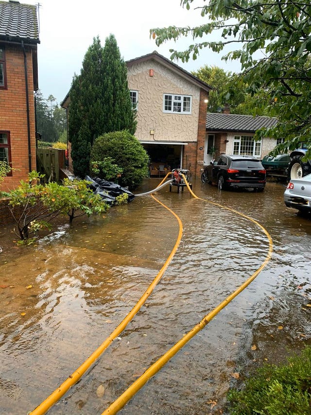 Flooding in Carlisle, as the Met Office has warned of torrential rain and thunder in parts of the country