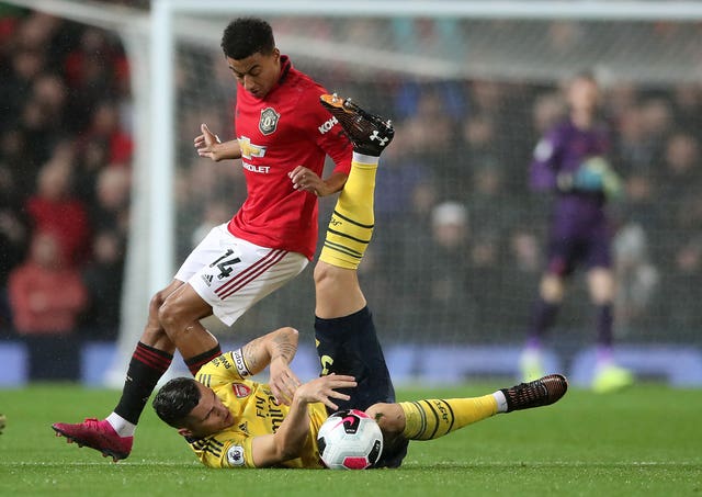 Granit Xhaka, right, had a tough evening at Old Trafford