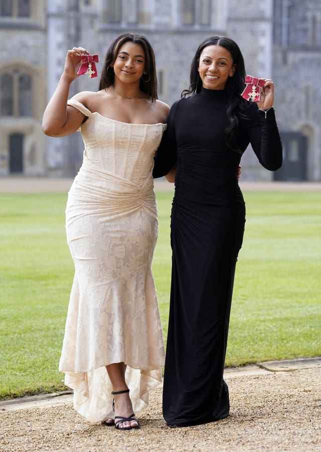 Elissa Downie (Ellie Downie, left) and Rebecca Downie (Becky Downie) after being made Members of the Order of the British Empire (MBE) during an investiture ceremony at Windsor Castle, Berkshire