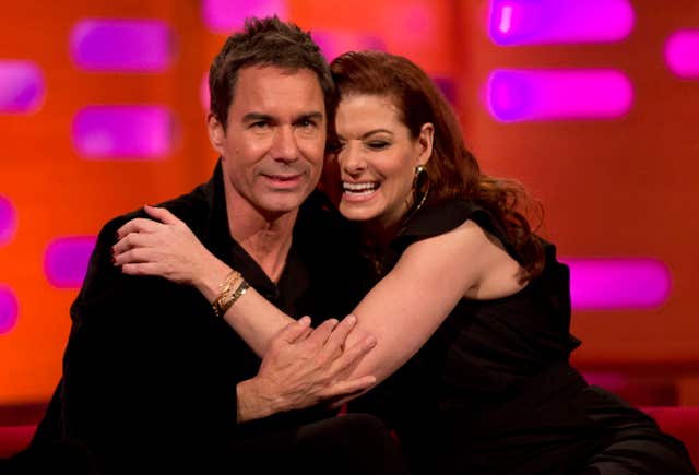 Eric McCormack and Debra Messing hugging