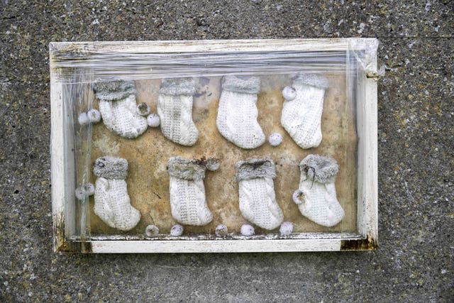 Baby socks in a frame