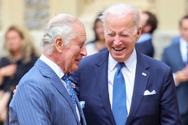 The King with then-US President Joe Biden in the quadrangle at Windsor Castle in 2023 