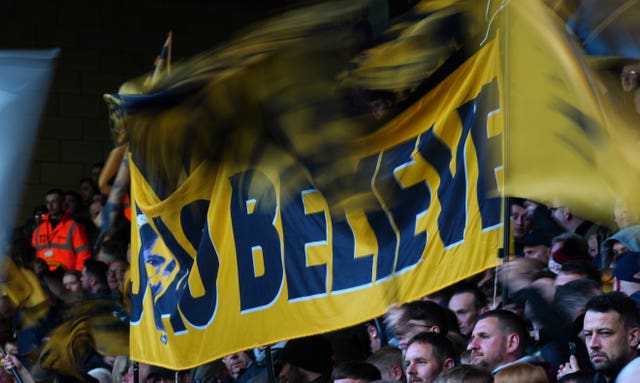 Wolves fans hold up a banner reading ''Joao Believe'' in honour of midfielder Joao Moutinho