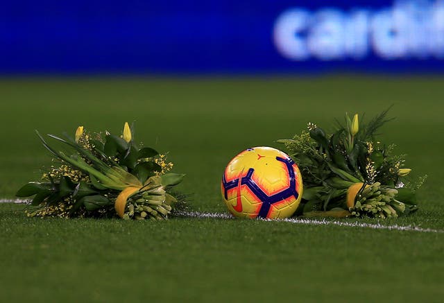 Flowers placed on the pitch ahead of Cardiff City's match on Saturday 