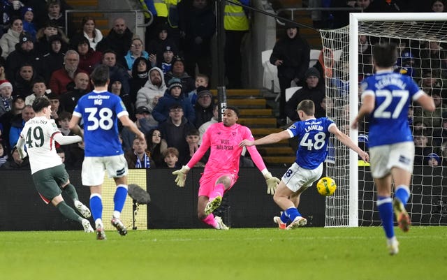 Alejandro Garnacho, left, scores Chelsea’s first goal against Cardiff