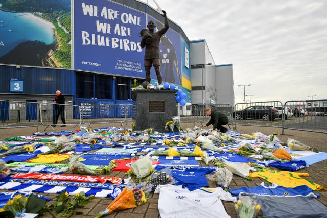 Flowers and tributes left outside Cardiff City Football Club