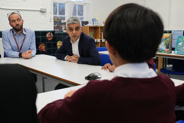 Sadiq Khan speaks to a school pupil