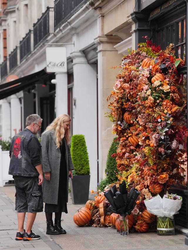 A display of leaves and pumpkins outside Neill Strain Floral Couture store in Mayfair