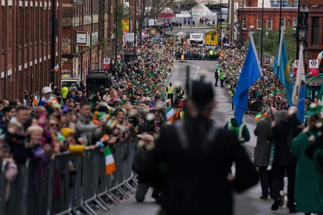 Crowds gather to watch performers take part in the St Patrick’s Day Parade in Birmingham