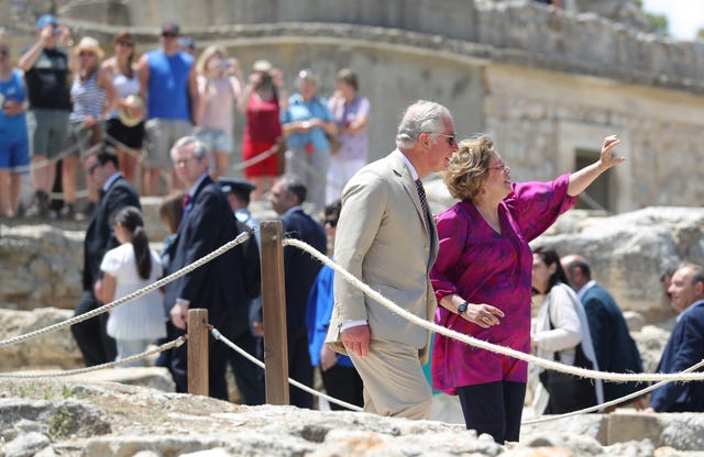 The prince had a tour of the site in Crete (Andrew Matthews/PA)