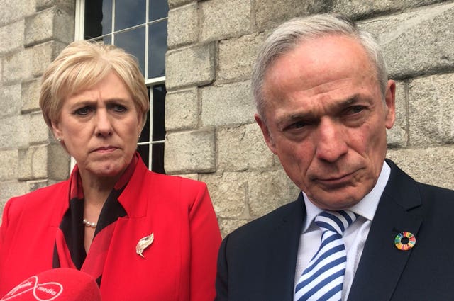 Minister for Business Heather Humphreys and Communications Minister Richard Bruton outside Dublin Castle 