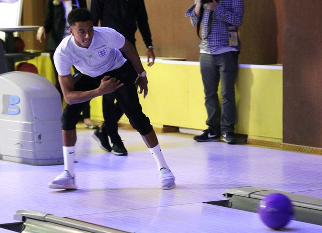 Jesse Lingard was one of several England players to show off their skills on the lanes as they bowled in the media centre in Repino