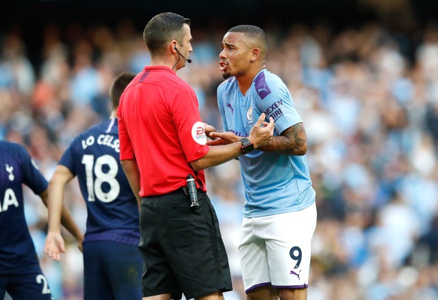 Gabriel Jesus pleads with referee Michael Oliver, left