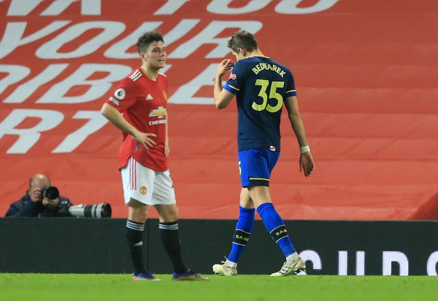 Jan Bednarek (right) was given his marching orders on a dismal night for Southampton at Old Trafford