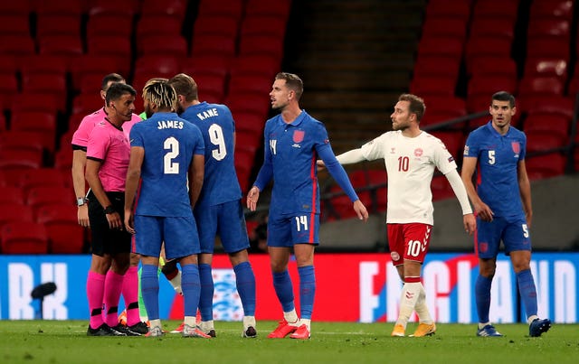 Reece James, second left, confronts referee Jesus Gil Manzano after the final whistle and is sent off