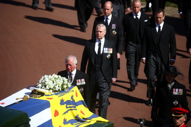 Senior royals walk behind the Duke of Edinburgh's coffin