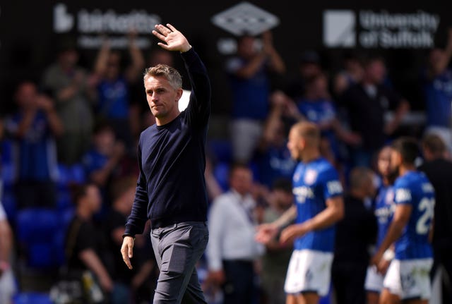 Ipswich manager Kieran McKenna waves to fans 