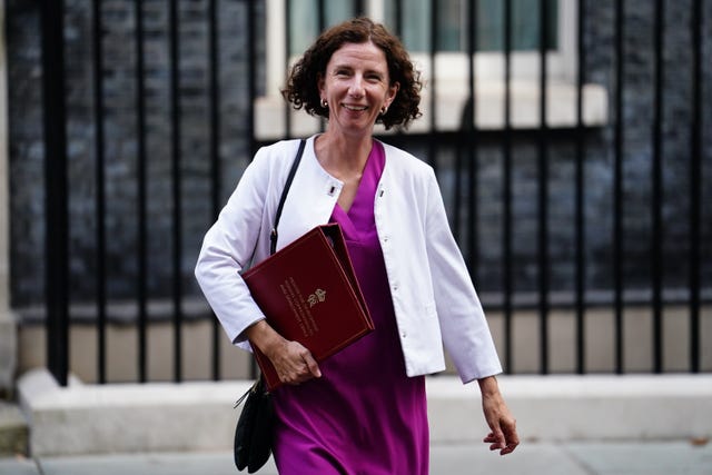 Foreign Office minister Anneliese Dodds walking along Downing Street with a folder