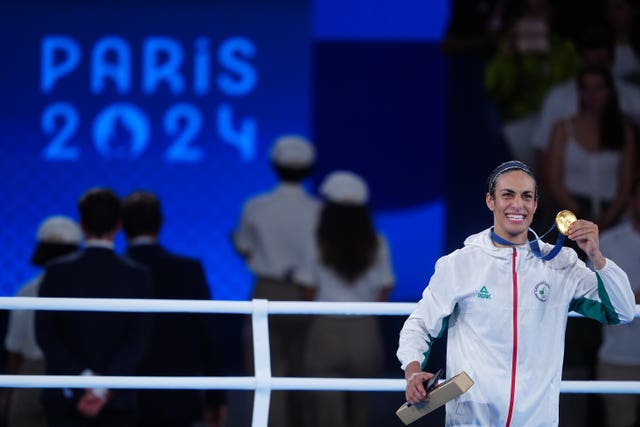 Algeria's Imane Khelif with her medal after winning gold in the women's welterweight category in the Paris Olympics