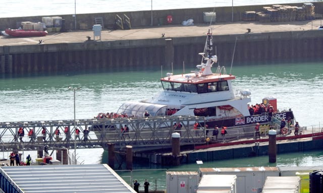 A group of people thought to be migrants are brought in to Dover from a Border Force vessel