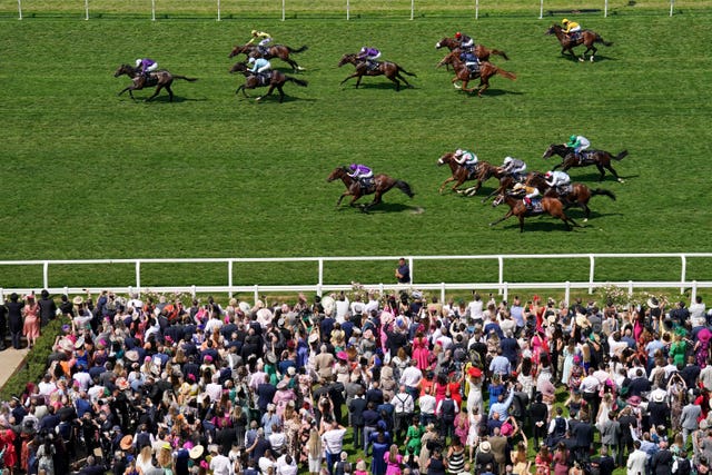 Valiant Force (left) leads the way in the Norfolk Stakes