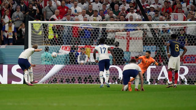 Harry Kane scores from the spot against France in the World Cup quarter-final to equal Wayne Rooney's record