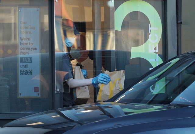 Cars queue at the McDonald’s drive-thru in Hounslow as McDonalds has reopened three of its restaurants in London but only as drive-thrus after the introduction of measures to bring the country out of lockdown