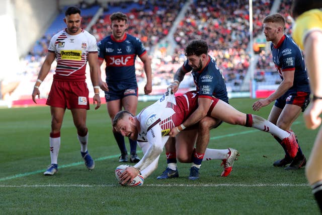 Jackson Hastings scored twice as Wigan Warriors beat Hull KR 30-16 to go top of the Betfred Super League