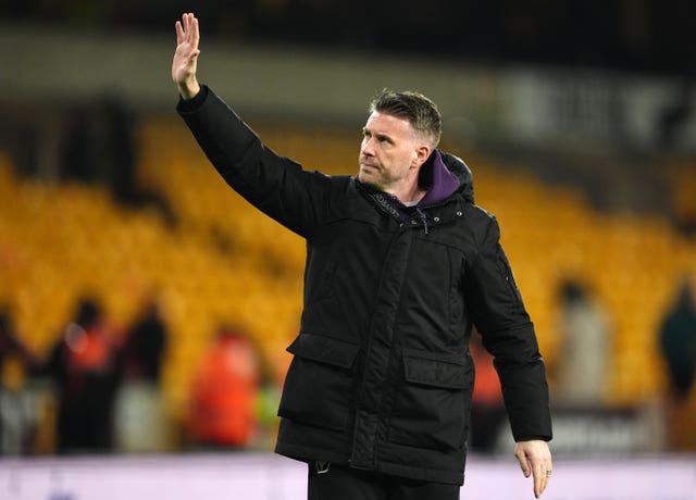 Rob Edwards waves to the Wolves fans