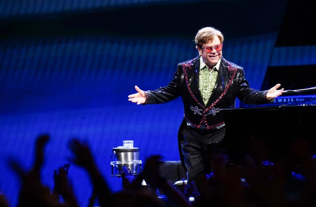 Elton John performs on stage during his Farewell Yellow Brick Road show at the O2 Arena, in London (Ian West/PA)