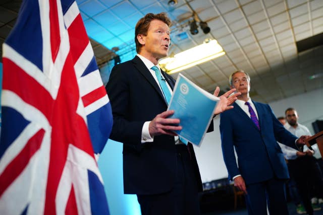 Richard Tice (left) and party leader Nigel Farage speak as they launch Reform's pledges