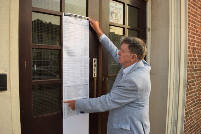 Ian Davidson Chief Executive of Tendring District Council, posting the Statement of Persons Nominated for the Clacton by-election, at the town hall