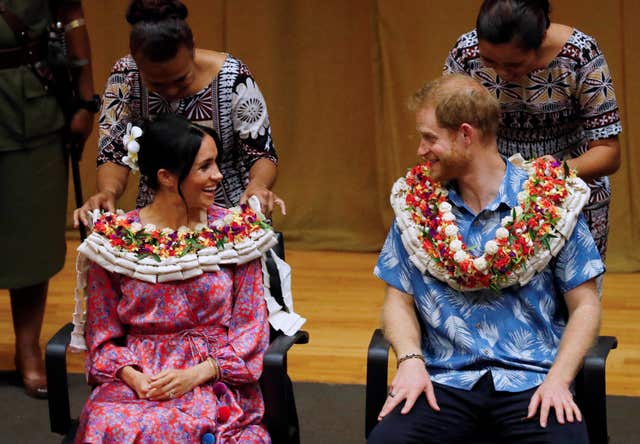 Harry and Meghan were presented with garlands during their visit