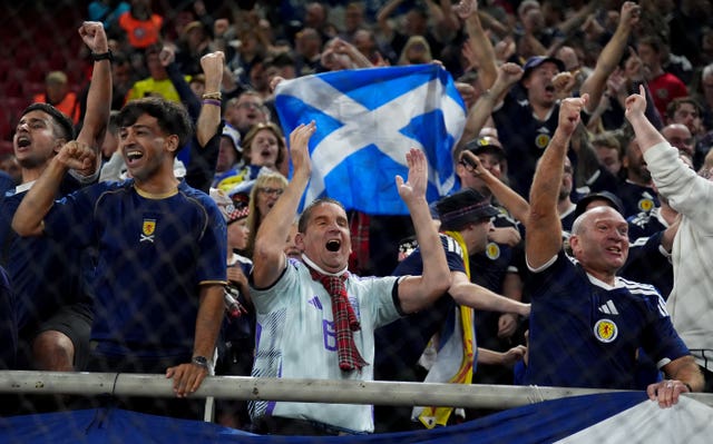 Fans in the crowd at the Greece v Scotland World Cup European qualifier at Georgios Karaiskakis Stadium