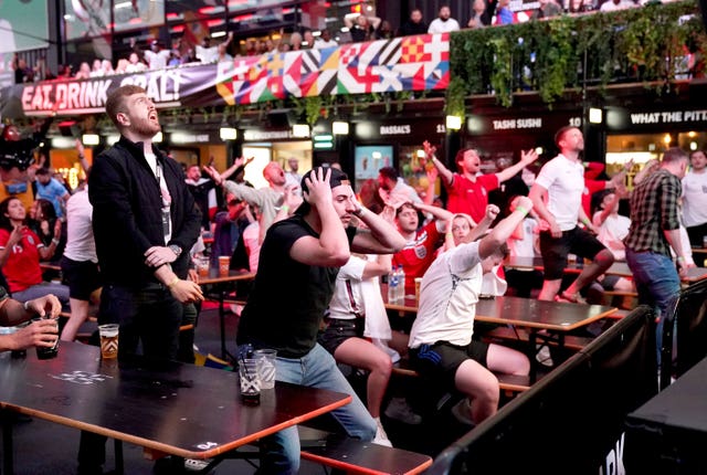 Fans watching England v Denmark