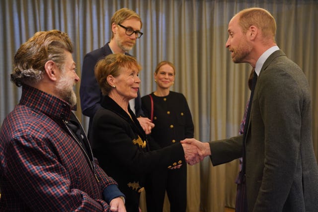 The Prince of Wales speaks to (left to right) Andy Serkis, Celia Imrie, Stephen Merchant and Mircea Monroe